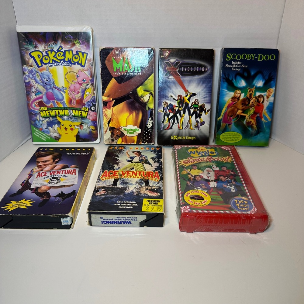 VHS Lot of 7 Pokémon First Movie Scooby-Doo X-Men The Mask Ace Ventura Wiggles
